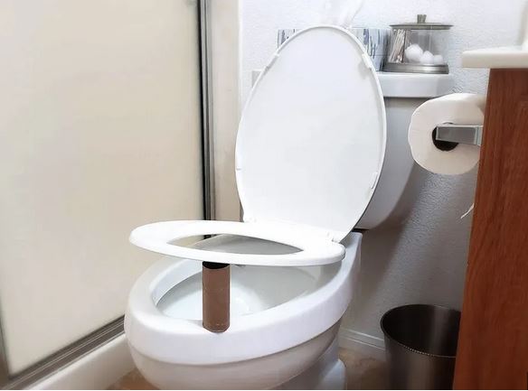 Place a toilet roll under the toilet seat at your hotel