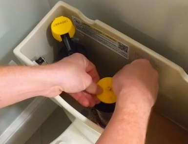 Kohler cimarron toilet leaking between tank and bowl