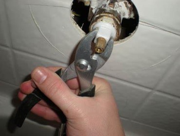 How do I fix my Delta shower cartridge?