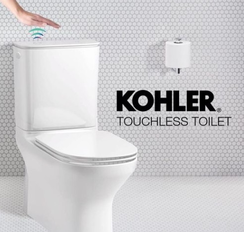 How do you flush a touchless Kohler toilet?