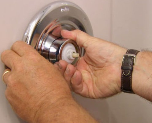 How do you fix a loose shower faucet?