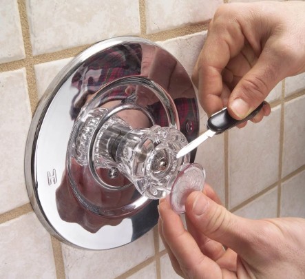 What causes a shower to keep dripping?